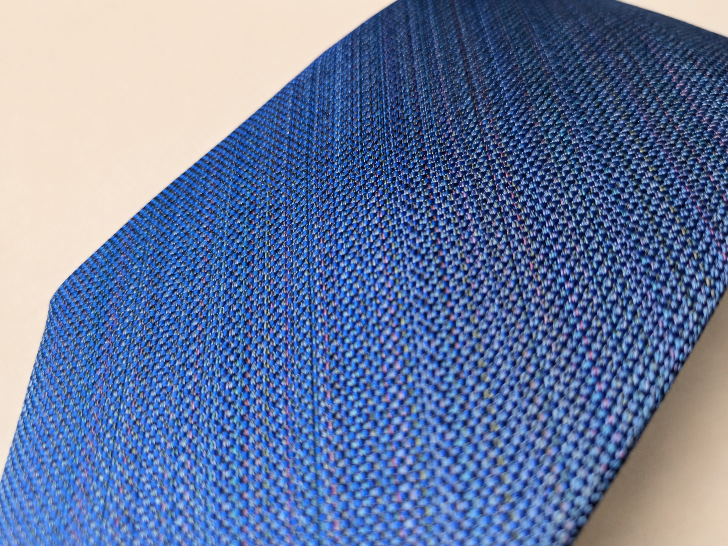 Sanui Hakata-ori mud-dyed silk necktie in navy, weave detail
