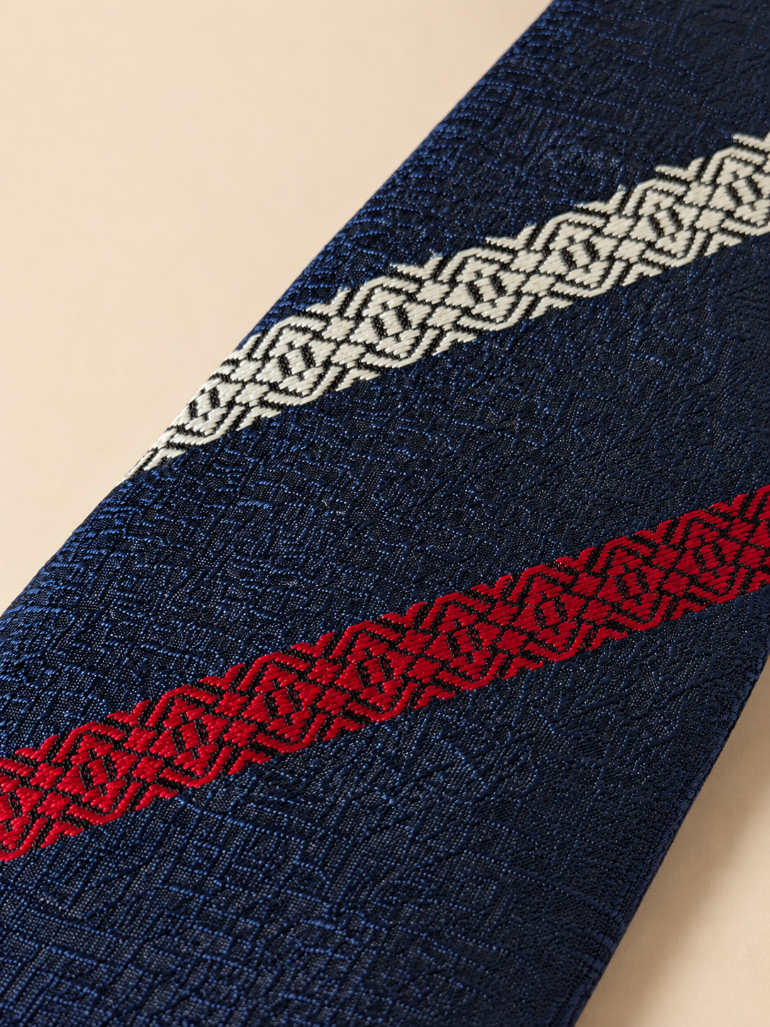 Sanui Hakata-ori slanted Kenjo silk necktie in navy, weave detail