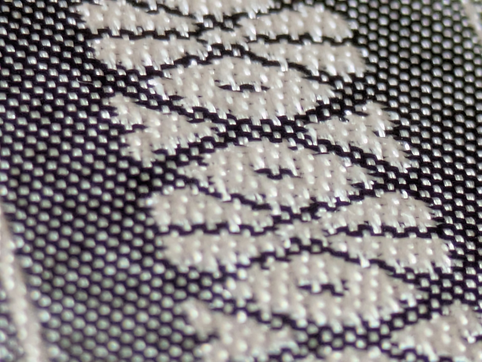 Close-up of the gray Kenjo-pattern Hakata-ori silk weave