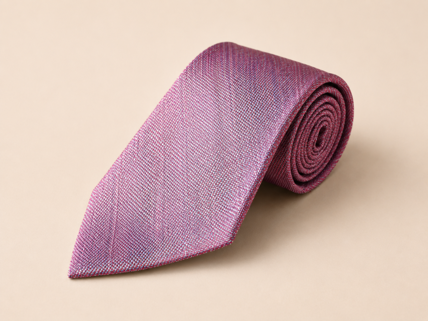 Sanui Hakata-ori mud-dyed silk necktie in wine, rolled view