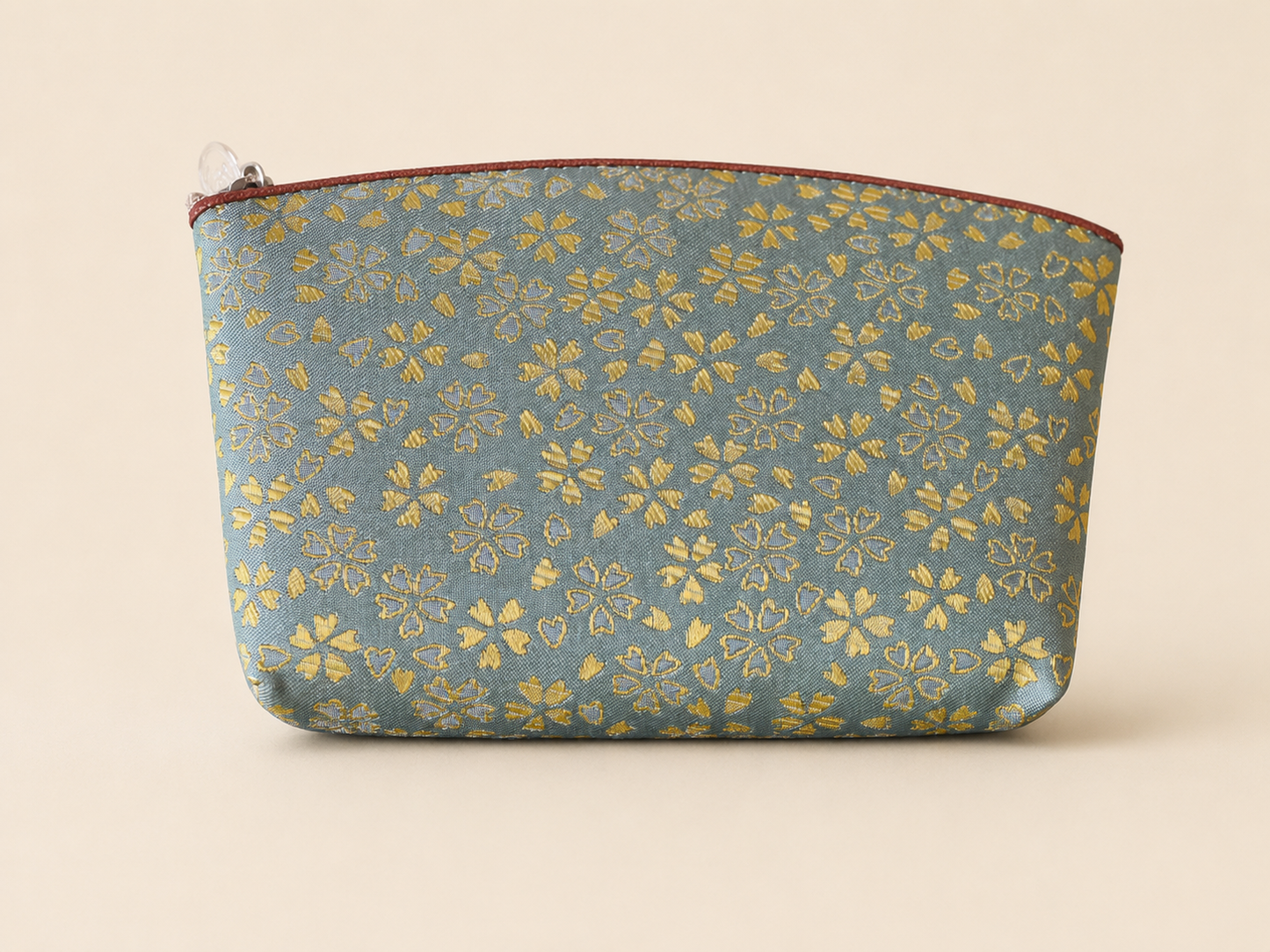 Green Hakata-ori Sakura pouch by Sanui Textile, front view