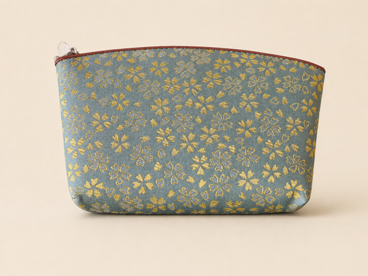 Green Hakata-ori Sakura pouch by Sanui Textile, front view