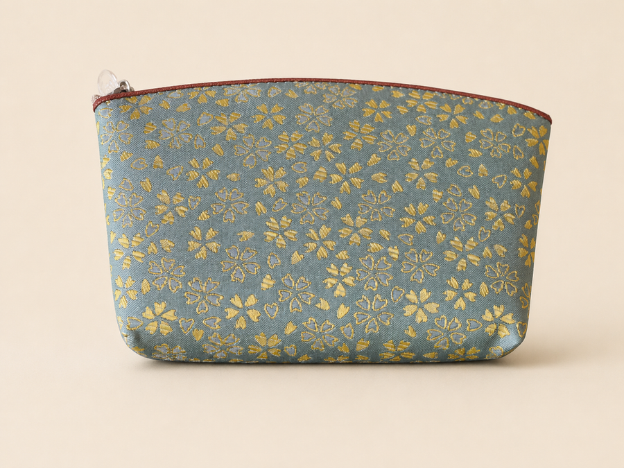 Green Hakata-ori Sakura pouch by Sanui Textile, front view