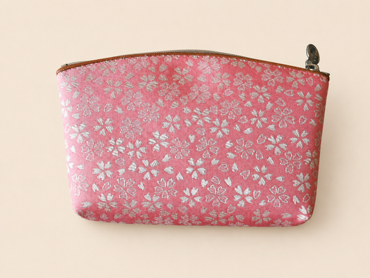 Pink Hakata-ori Sakura pouch by Sanui Textile, front view